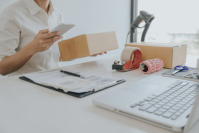 Man using laptop on table