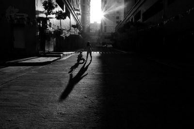 People walking on street in city
