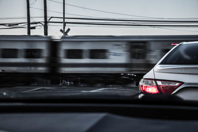 Close-up of car against sky