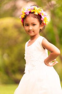 Portrait of a girl standing on rock