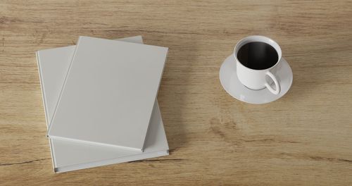 High angle view of coffee cup on table