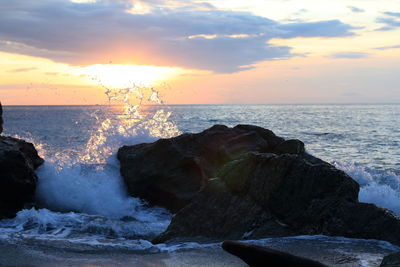 Scenic view of sea against sky during sunset