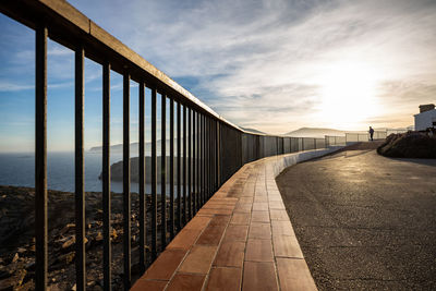 View of bridge against cloudy sky