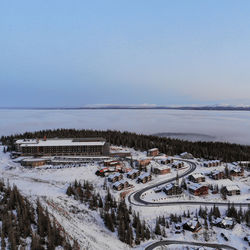 High angle view of snow covered landscape against sky