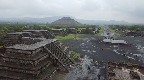 High angle view of historic building against cloudy sky