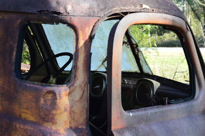 Close-up of abandoned car window