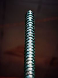 Close-up of rusty metal against wall