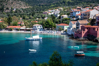 High angle view of townscape by sea