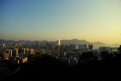 High angle view of buildings against sky during sunset