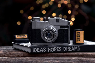 Close-up of camera on table