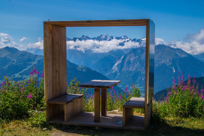 Scenic view of snowcapped mountains against sky