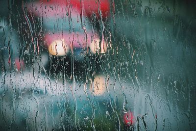 Close-up of water drops on glass