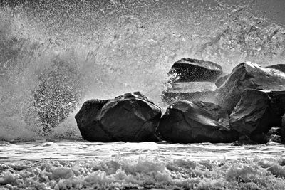 Close-up of water splashing on white background