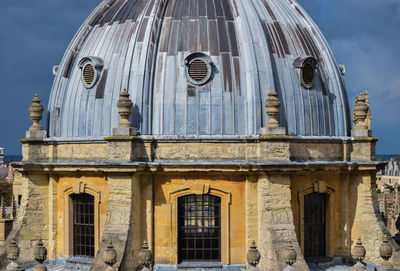 Oxford university against sky in city