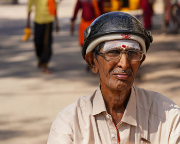 Portrait of man wearing mask outdoors