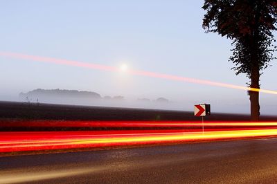 Light trails on road at night