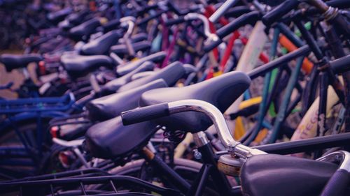 Close-up of bicycle in row