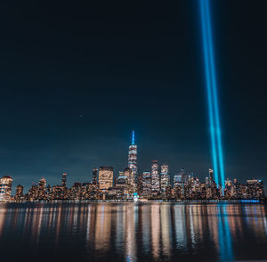 Illuminated buildings in city at night