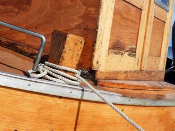 Low angle view of old metallic structure on hardwood floor