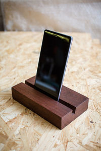 Close-up of smart phone on table