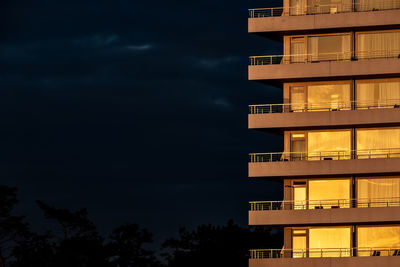 Low angle view of building against sky at night