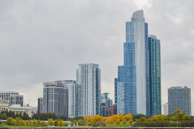 Low angle view of skyscrapers against sky