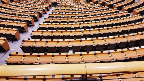 High angle view of empty chairs in auditorium