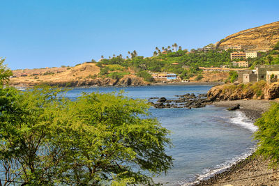 Scenic view of sea against clear blue sky