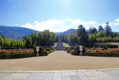 Scenic view of mountains against blue sky