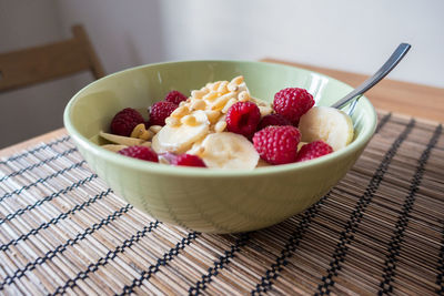 Close-up of strawberries in bowl on table