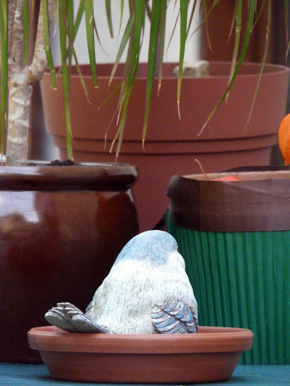 LOW SECTION OF MAN SITTING IN PLASTIC