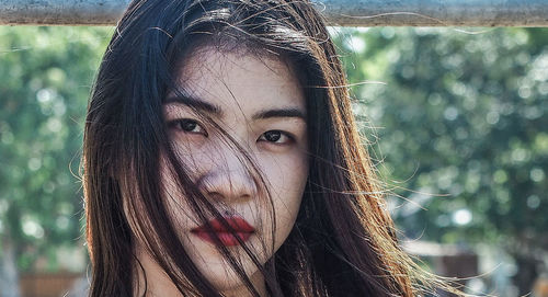 Close-up portrait of young woman