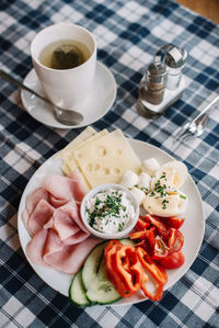 High angle view of breakfast served on table