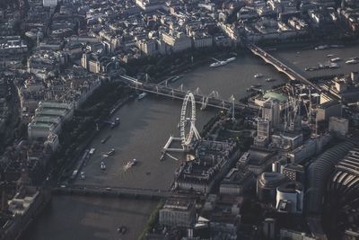 High angle view of river amidst buildings in city