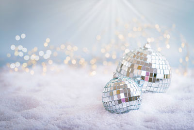 Close-up of crystal ball on snow
