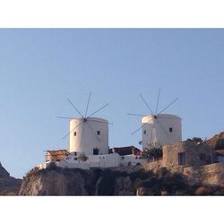 Traditional windmill against clear sky