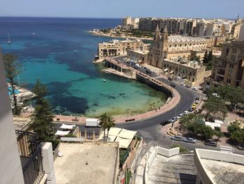 View of sea with buildings in background