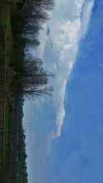 Scenic view of landscape against cloudy sky