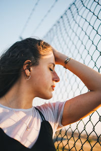 Portrait of young woman looking away