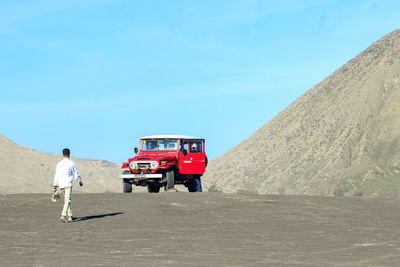 Rear view of man on the road