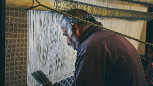 Side view of man working