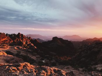 Scenic view of mountains against sky during sunset