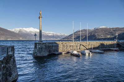 Lake maggiore with the snow-capped mountains in the background