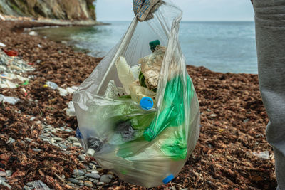 Garbage on rock at beach