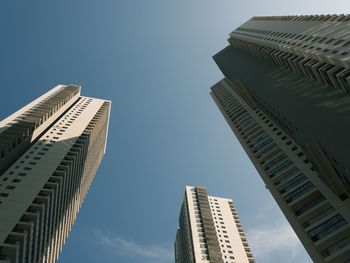 Low angle view of modern buildings against clear sky