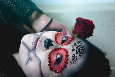 Close-up portrait of young woman with face paint during halloween