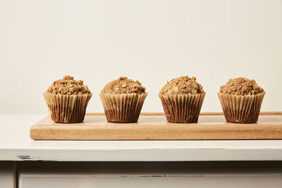 Close-up of cupcakes against white background