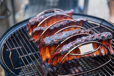 Close-up of meat on barbecue grill