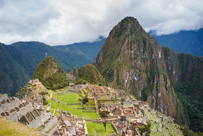 View of old ruins against cloudy sky