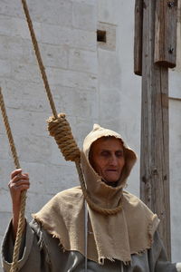 Close-up of man hanging noose